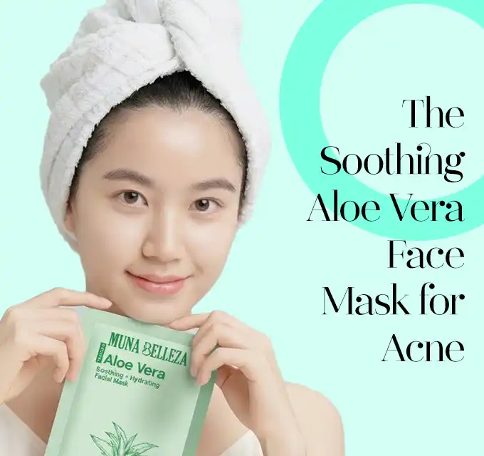 Woman with towel turban holding a green aloe vera sheet mask sachet up to her chest, smiling at camera