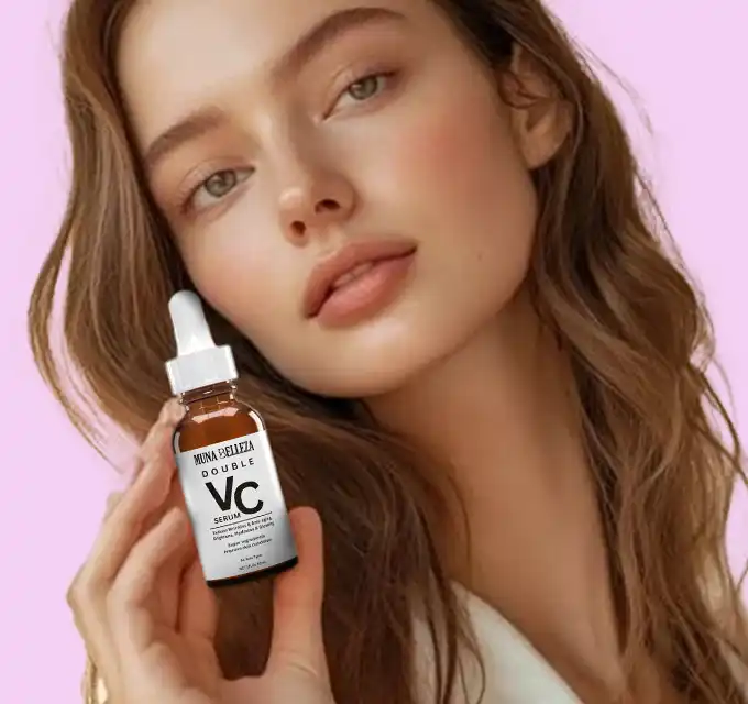 "Vitamin C moisturizing serum bottle being held in hand"